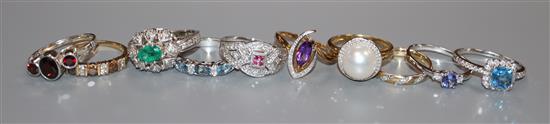 Ten assorted gem set gold dress rings, including seven 9ct gold, two 14k and one 18ct gold.